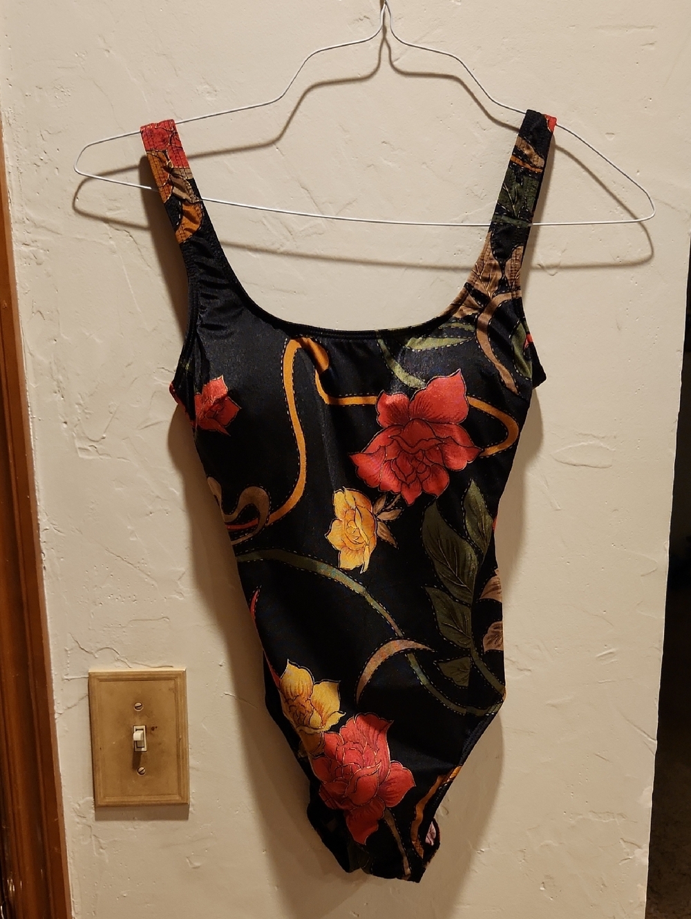 Longitude Black Floral Swimsuit with Red and Yellow Accents